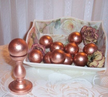 Sfera di legno ramata