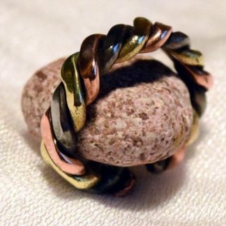 anillo con 3 metales: cobre, hierro, latón