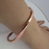 par de 2 pulseras de cobre y latón