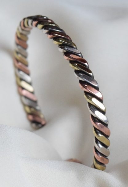 bracelet in copper, silver and brass