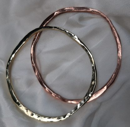 set of 2 bracelets one copper and one  brass