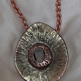 pendant in silver and copper with quartz