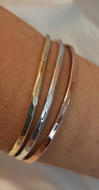 three metal bracelet copper, silver, brass