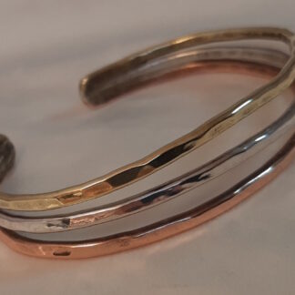 three metal bracelet copper, silver, brass