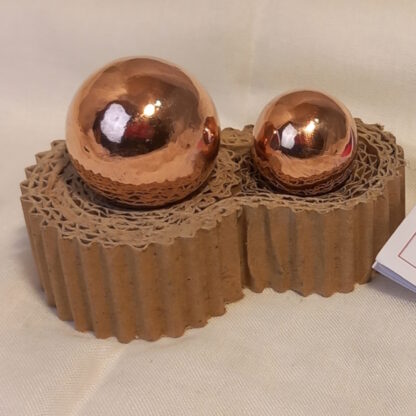 pair of copper balls